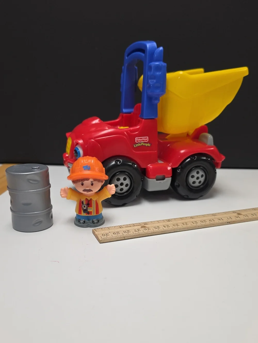 Fisher-Price Little People Red & Yellow Dump Truck with Figure And Accessory
